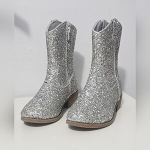 Josmo brand, mid-calf cowboy boots with a striking silver glitter finish.